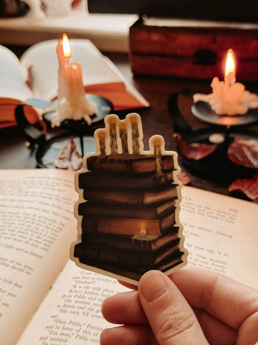 Melting Candles and Books Glow Sticker