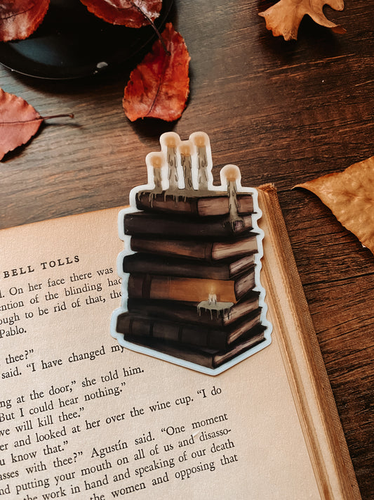 Melting Candles and Books Glow Sticker